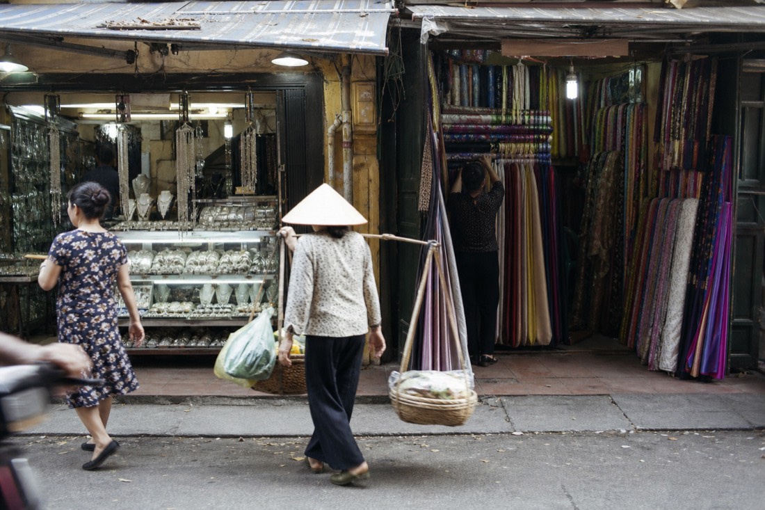Silverware and silk shopfronts on adjoining Hang Bac and Hang Gai guild streets in Hanoi's Old Quarter